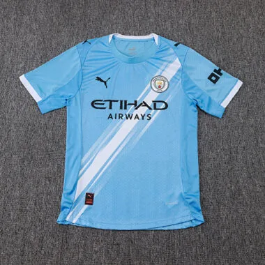 Image 3 de l’album Maillot à manches courtes et pantalon domicile Manchester City 25-26