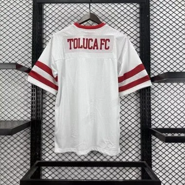 Imagem 2 do álbum Camisolas de futebol do Toluca 26-27