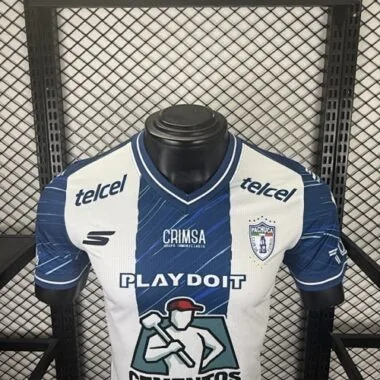 Imagem 7 do álbum Camisolas de futebol da equipa da casa do Pachuca, versões dos jogadores, n.ºs 25 e 26