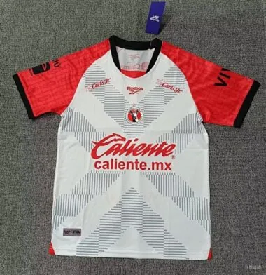 Portada del álbum Camisetas de fútbol del Tijuana para los partidos fuera de casa, 26-27
