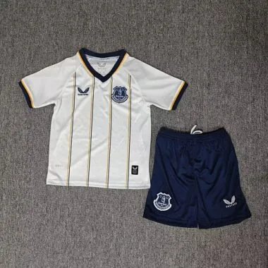 Capa do álbum: Camisola e calções infantis do Everton para os jogos fora de casa da época 2026/27
