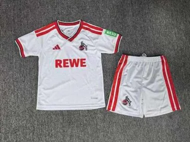 Camiseta y pantalones cortos infantiles de local del Colonia para la temporada 2026/27