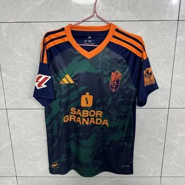 Capa do álbum Camisa de jogo fora do Granada 2026/27
