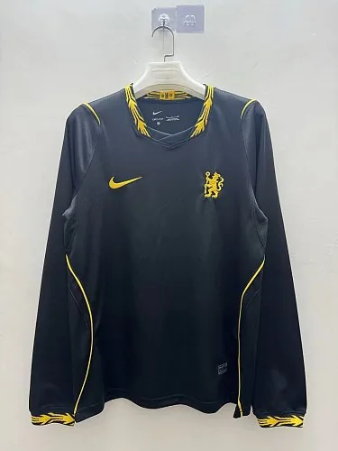 Portada del álbum Camiseta de manga larga del Chelsea para partidos fuera de casa, temporada 2026/27