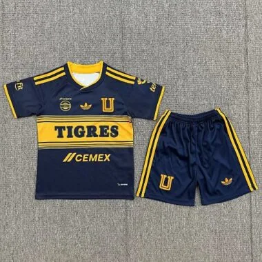 Portada del álbum: Camiseta y pantalones cortos infantiles de los Tigres para los partidos fuera de casa de la temporada 2026/27
