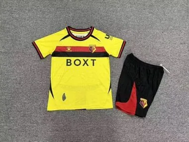 Camisola e calções infantis da Waterford para jogos em casa da época 2026/27