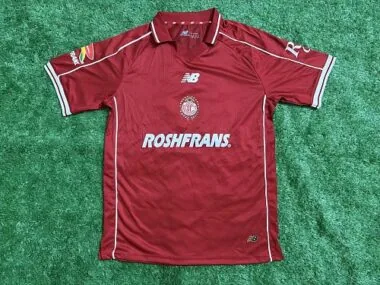 Capa do álbum Camisa de jogo em casa do Toluca 2026/27